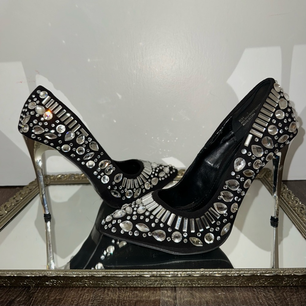 Black high heels with silver gems and silver heel